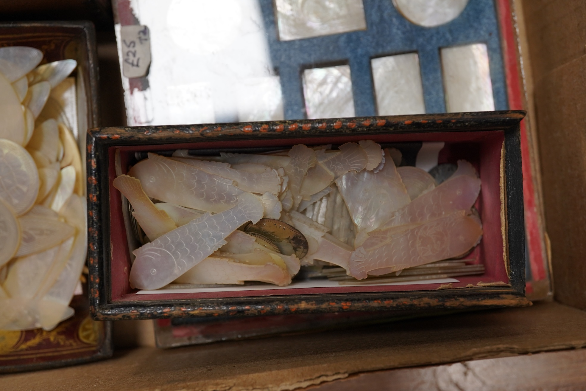 A group of 19th century Chinese mother of pearl gaming counters and accessories, together with a miniature silver cased compass